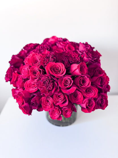The ultimate luxury gift of romance, 100 stems of premium red roses in an elegant vase for anniversary, birthday, engagement, or just because. Order for delivery in Edina, Minneapolis, South Minneapolis, Eden Prairie, Bloomington, Wayzata and Richfield
