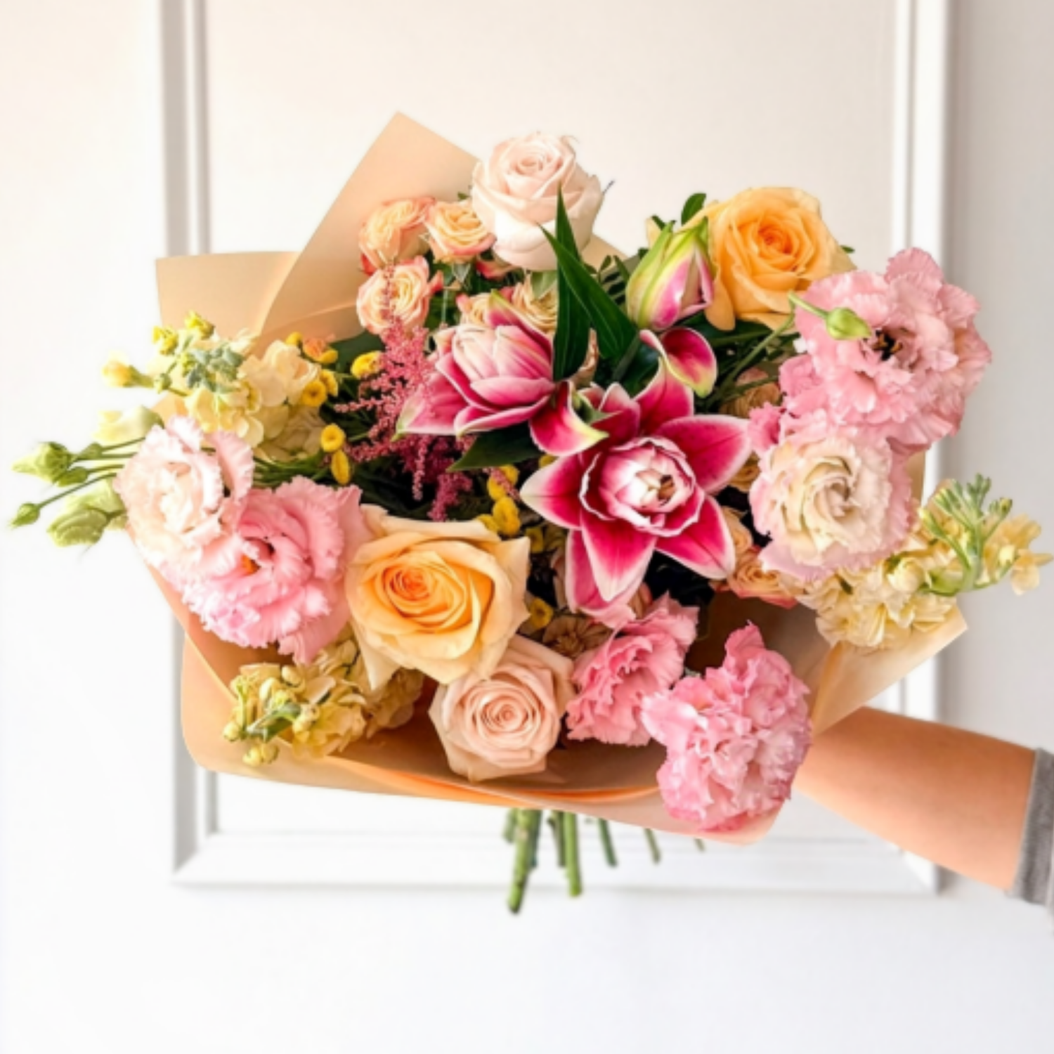 Summer bouquet of lilies, roses, and lisianthus for birthday, anniversary, get well, new baby or just because for delivery in Edina, Minneapolis and Wayzata.