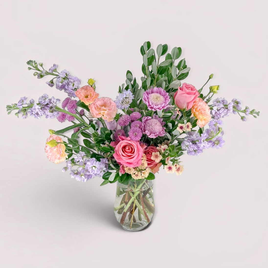 Luxury floral arrangement of summer flowers in glass vase for delivery in Minneapolis, Edina, Wayzata, Plymouth and Excelsior.