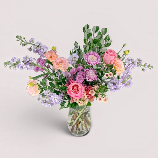 Luxury floral arrangement of summer flowers in glass vase for delivery in Minneapolis, Edina, Wayzata, Plymouth and Excelsior.