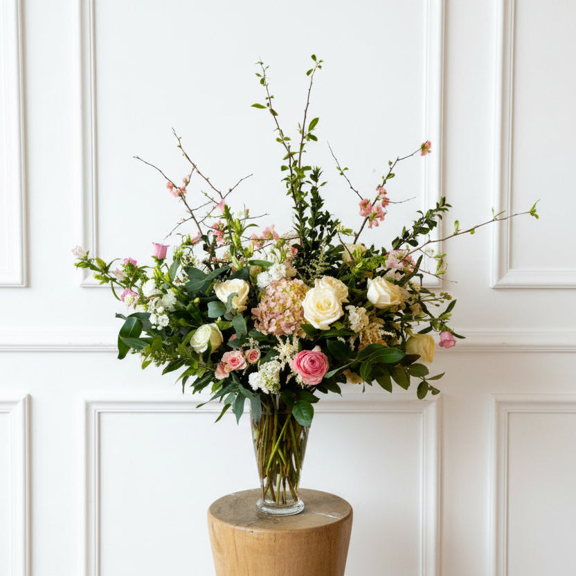 XL sympathy floral arrangement with abundant seasonal blooms in glass vase refined and natural garden-style design delivered to Edina, Uptown Minneapolis, and Minnetonka