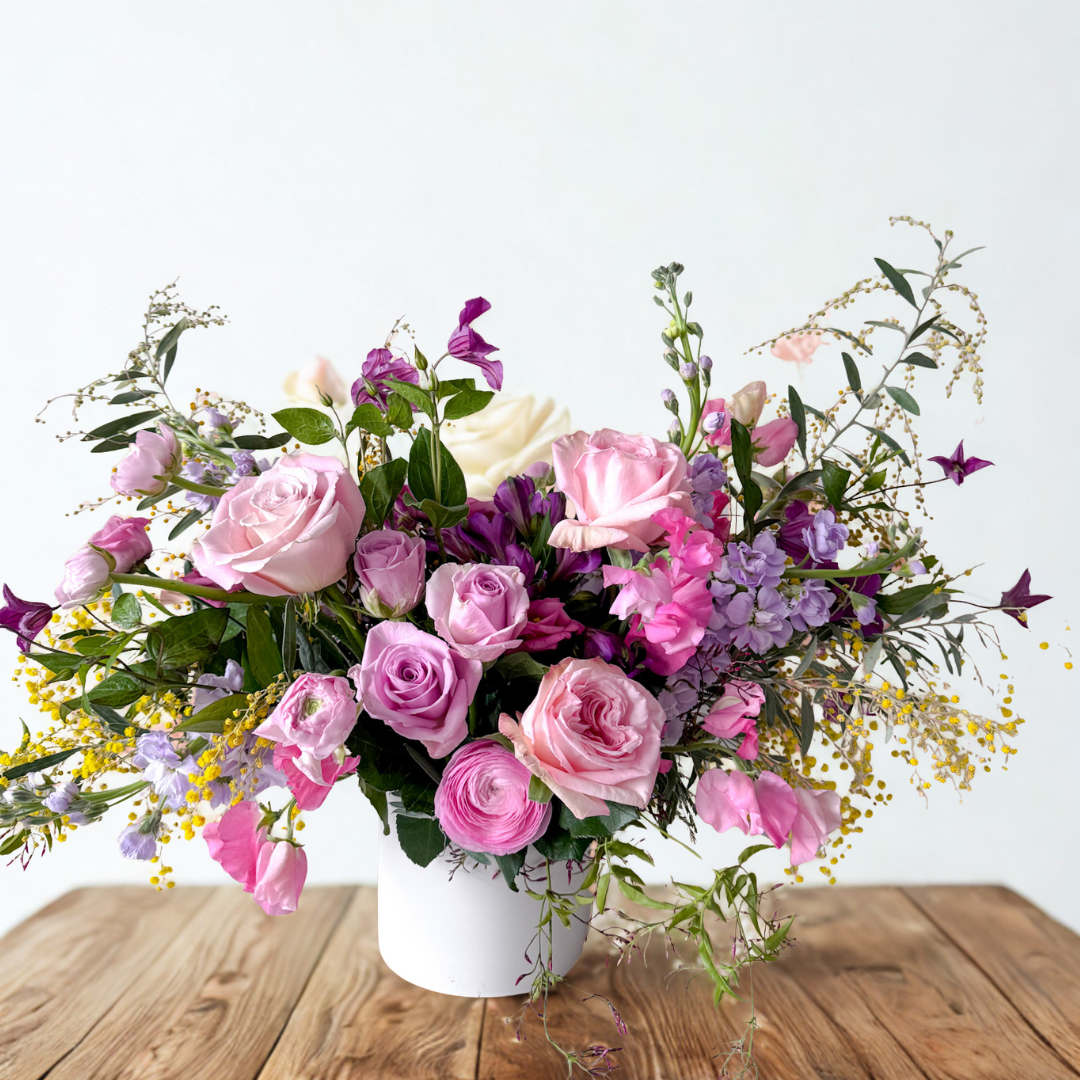 Luxury Classic floral arrangement featuring premium blooms in a garden-inspired ceramic vase, perfect for birthdays, anniversaries, or gifts in Minneapolis