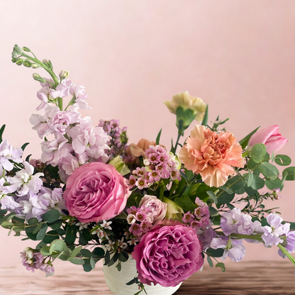 Garden-style floral arrangement with loose greenery and delicate seasonal blooms in a keepsake ceramic vase, Minneapolis & Edina delivery