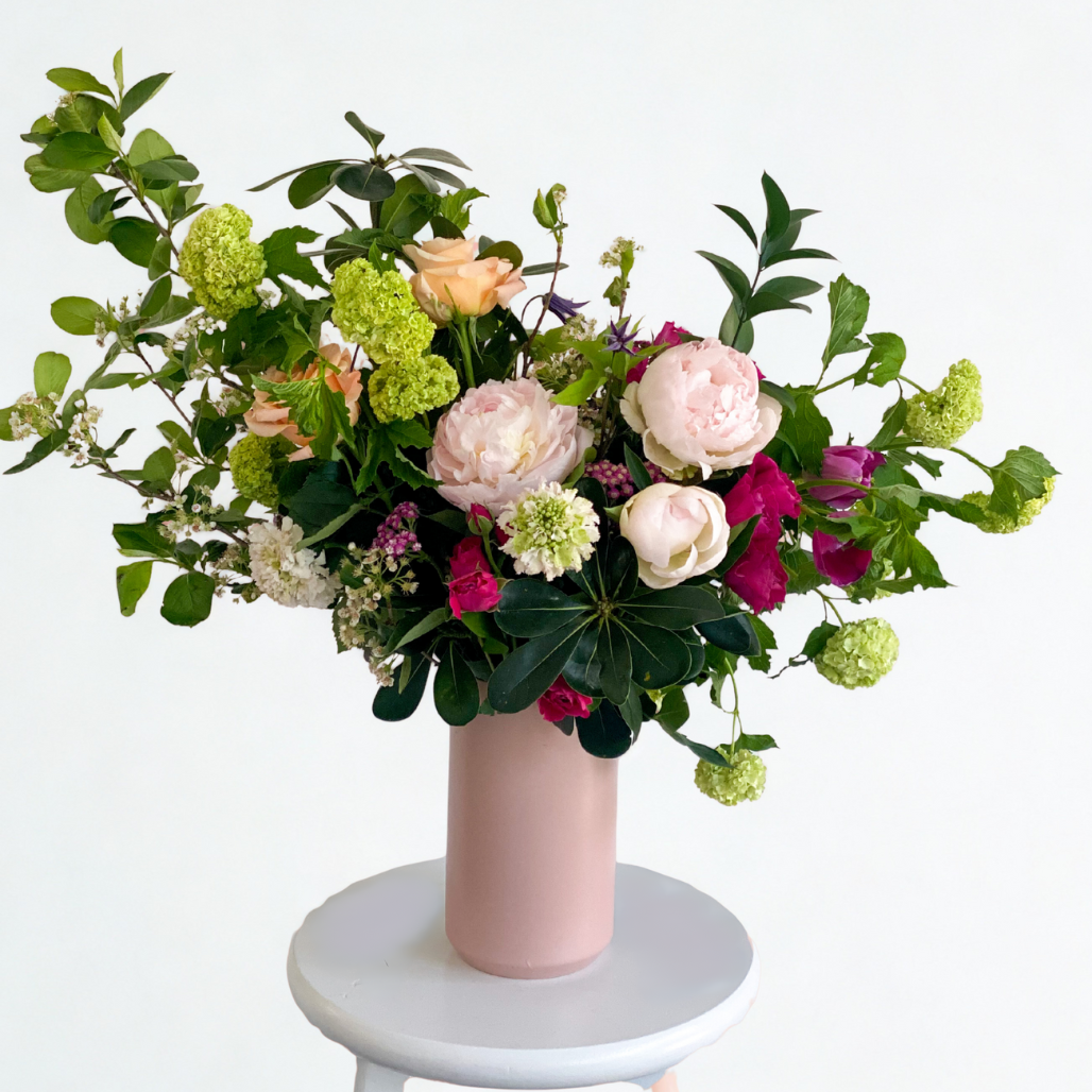 Premium garden-inspired floral arrangement with seasonal blooms in ceramic vase, luxury arrangement for Minneapolis & Edina delivery