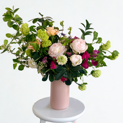 Premium garden-inspired floral arrangement with seasonal blooms in ceramic vase, luxury arrangement for Minneapolis & Edina delivery