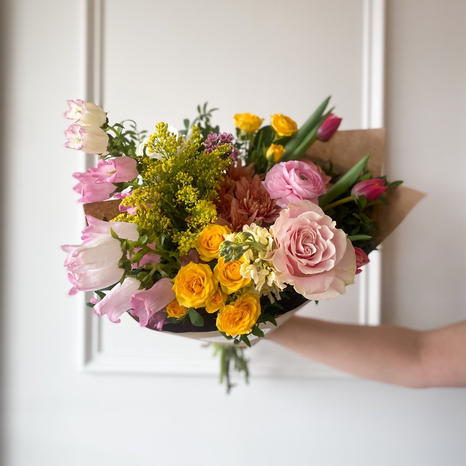 Premium hand-tied bouquet featuring pink seasonal flowers, perfect for gifts in Minneapolis or Edina