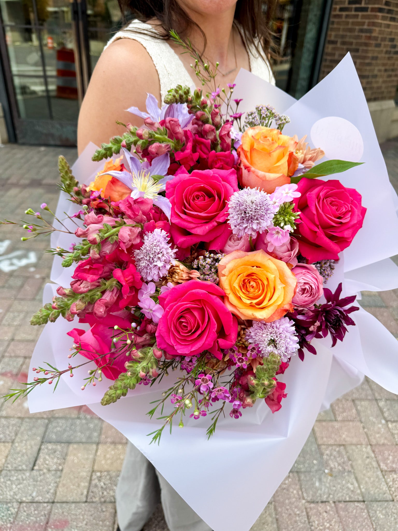 Luxury XL hand-tied bouquet featuring pink seasonal flowers, perfect for large gifts or events in Minneapolis or Edina