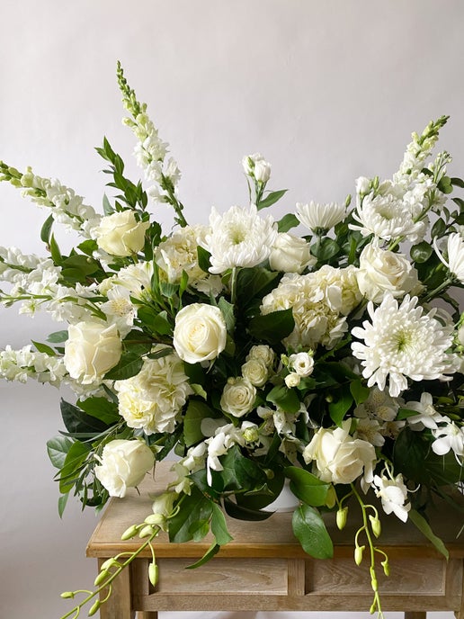 Order Funeral Flowers online in Edina. Servicing SW Minneapolis, Minnesota.