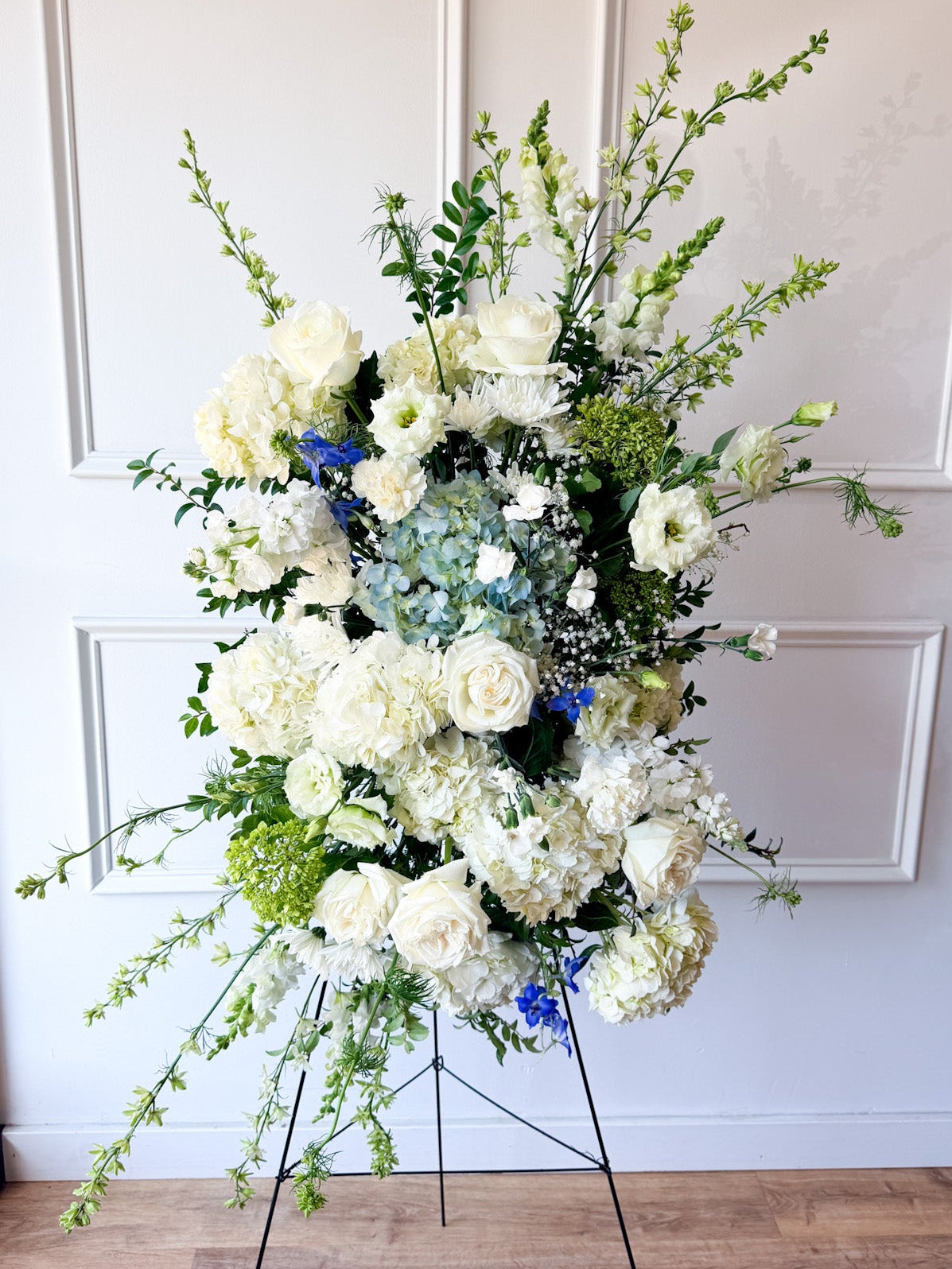 Luxury Premium spray on stand with white seasonal blooms, boutique floral design in elegant arrangement, pick-up in Edina or delivery to Uptown Minneapolis, South Minneapolis, and Richfield