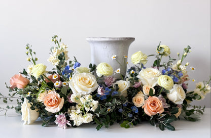 Luxury Classic urn surround with natural seasonal blooms, elegant funeral flowers arrangement, pick-up in Edina or delivery to Richfield, Hopkins, and Golden Valley