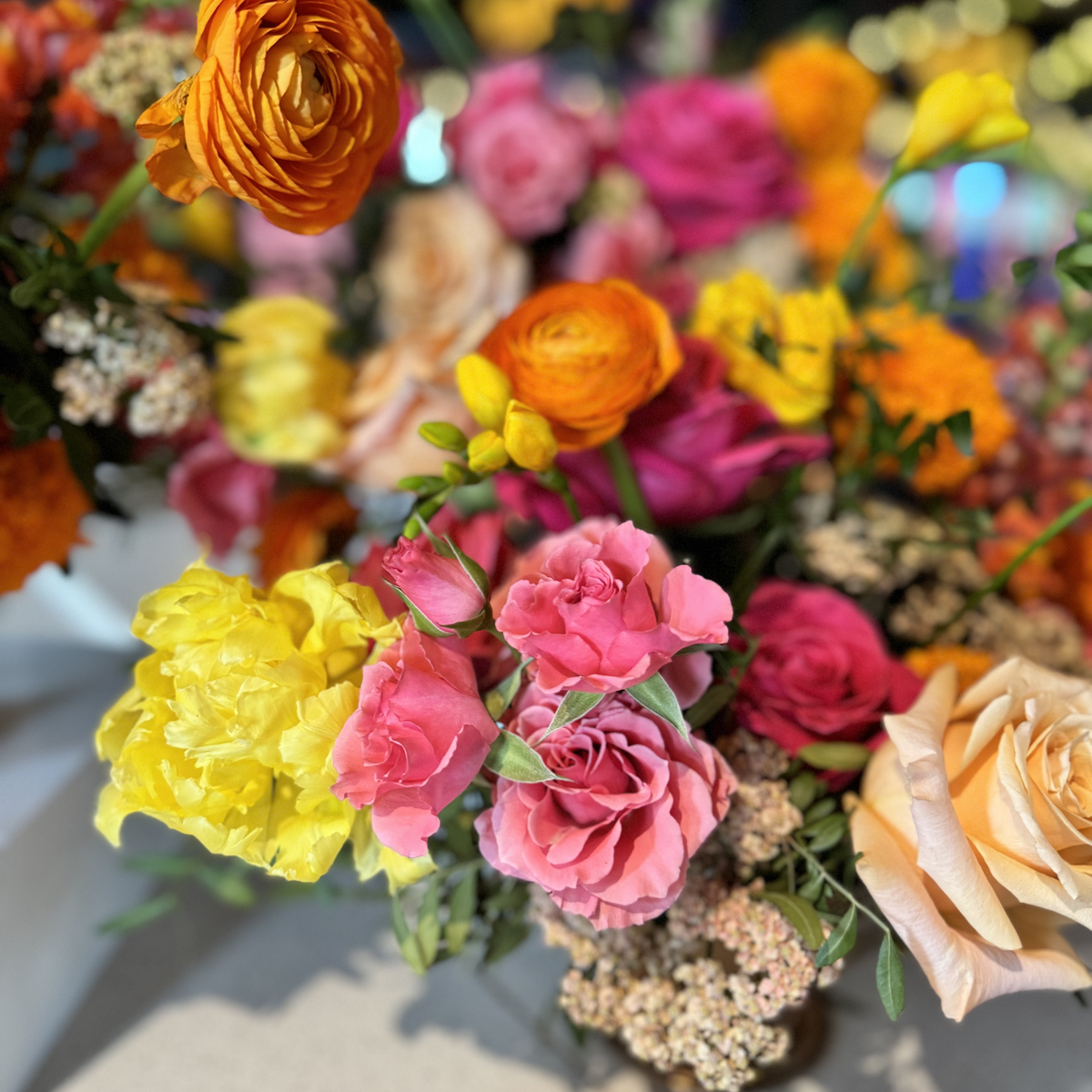 Diwali vase arrangements available for order with blooms in vibrant shades of orange, red, pink, and yellow. Order now for in-store pickup or local delivery to Minneapolis, Plymouth, Wayzata, and Minnetonka. 