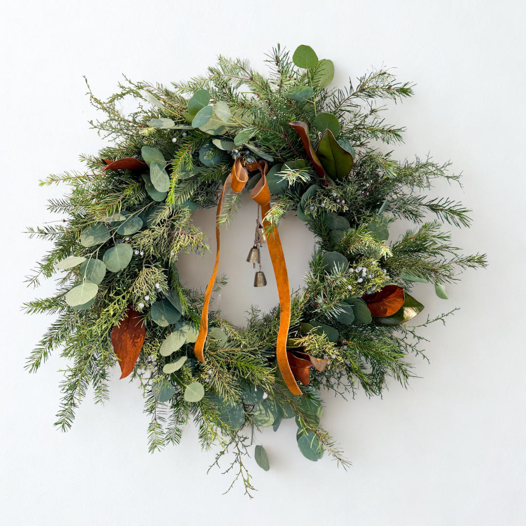 Handcrafted Premium holiday wreath featuring eucalyptus, textured greenery, and ribbon accent, ideal for luxurious holiday home décor or as a thoughtful seasonal gift, pick-up in Edina or local delivery
