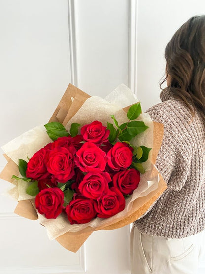 Three dozen luxurious premium red roses arranged in garden-style bouquet, ideal for gifting or special occasions, available for pick-up in Edina or delivery to Wayzata, Minneapolis, and Plymouth