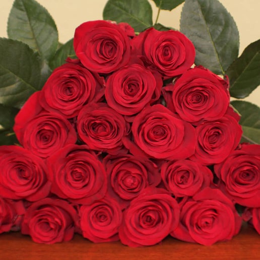 Hand-tied bouquet of red garden roses with vibrant blooms in elegant garden-style arrangement, luxury floral gift, available for pick-up in Edina or delivery to Hopkins, Minneapolis, and Bloomington