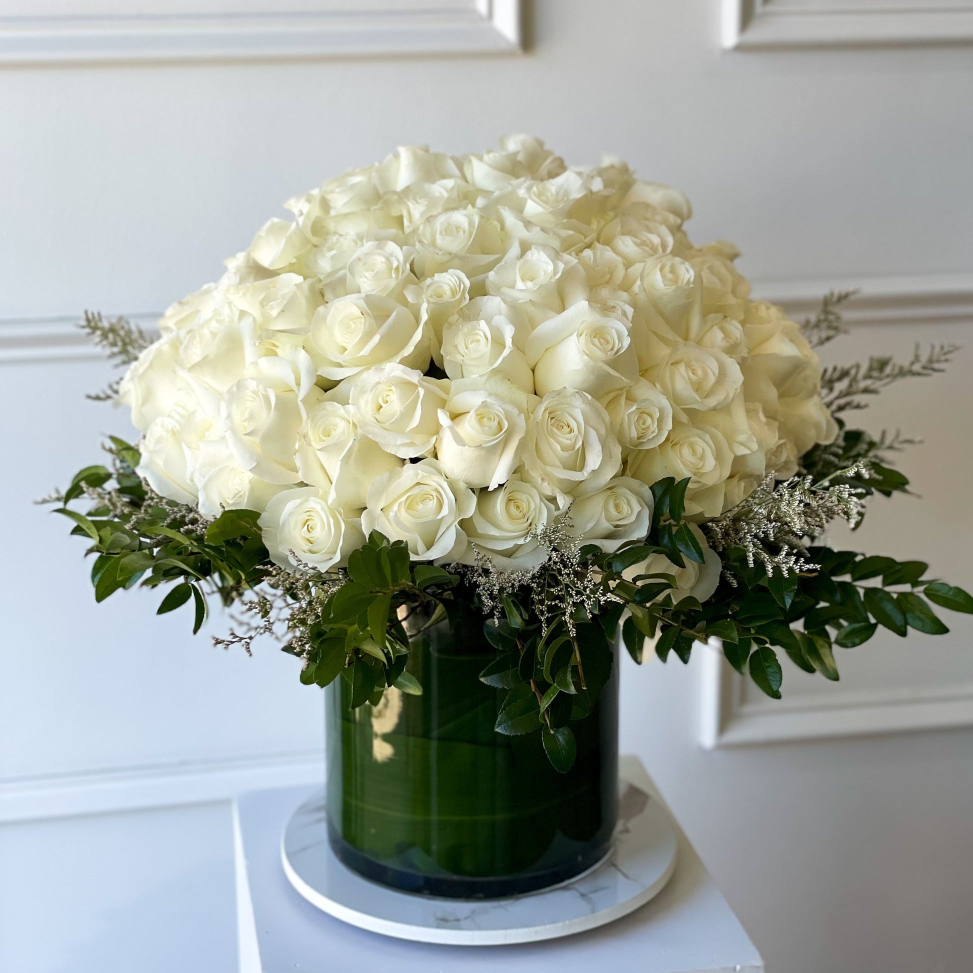 150 premium white roses in a refined vase, luxury garden-inspired floral arrangement, ideal for weddings, anniversaries, or special occasions, pick-up in Edina or delivery to Uptown Minneapolis, South Minneapolis, and Richfield