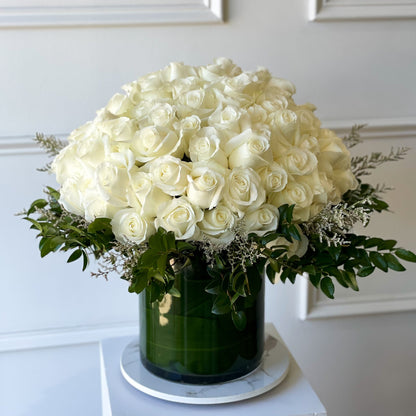 150 premium white roses in a refined vase, luxury garden-inspired floral arrangement, ideal for weddings, anniversaries, or special occasions, pick-up in Edina or delivery to Uptown Minneapolis, South Minneapolis, and Richfield