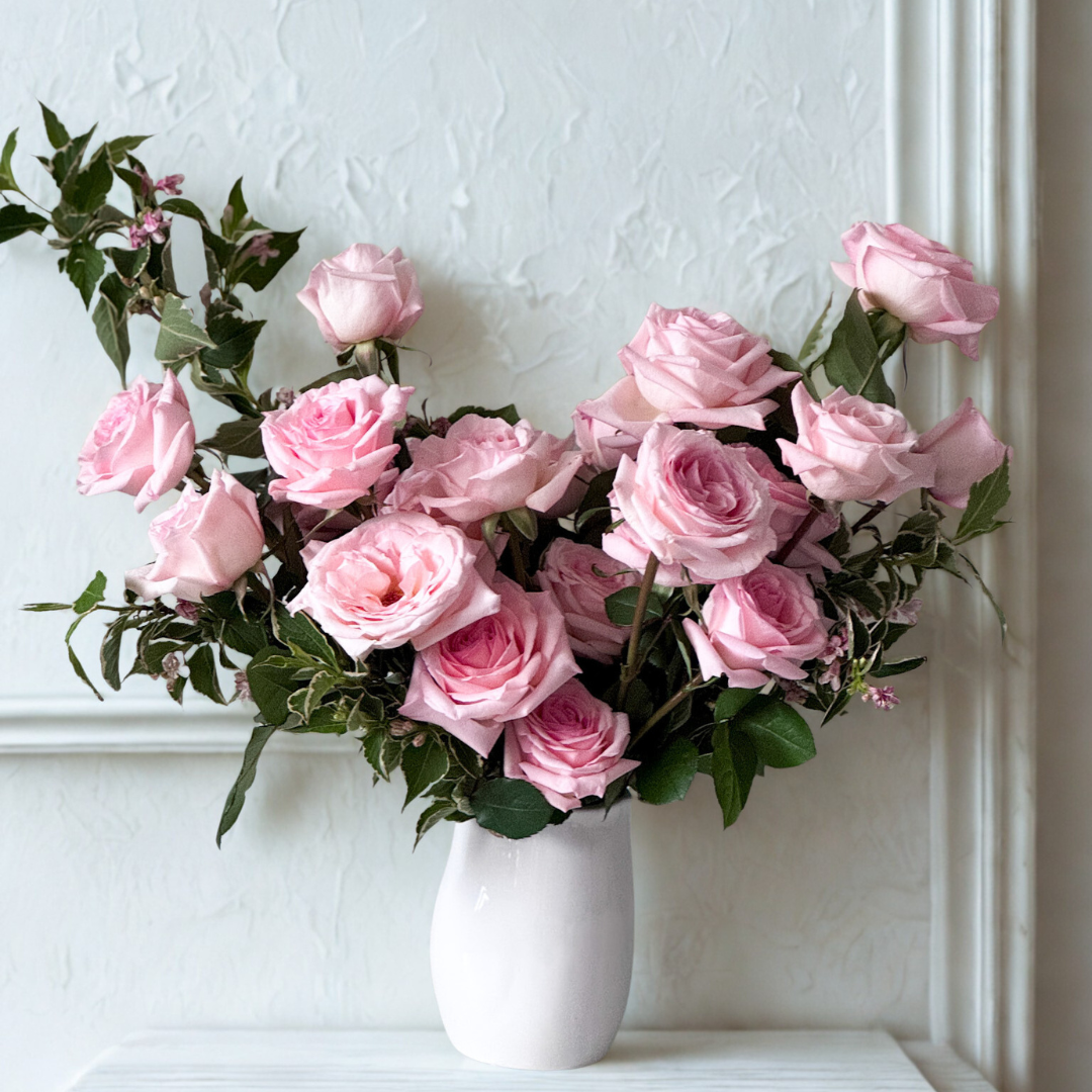 Designer’s choice Valentine’s rose arrangement featuring seasonal pink roses and accent greenery, from a trusted Edina florist for local delivery.