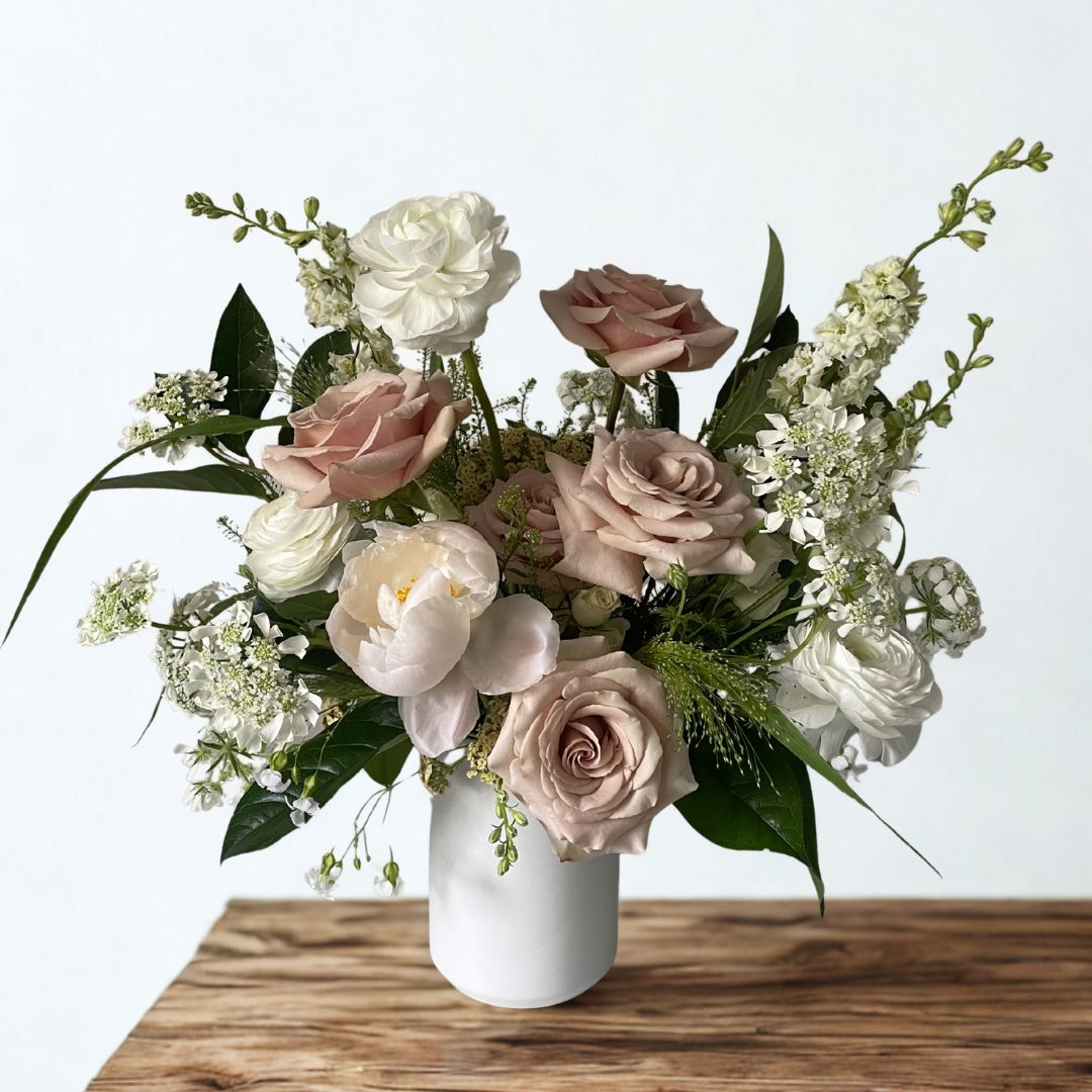 Classic refined sympathy arrangement with premium seasonal blooms in ceramic vase, delivered to South Minneapolis, St. Louis Park, and Uptown Minneapolis