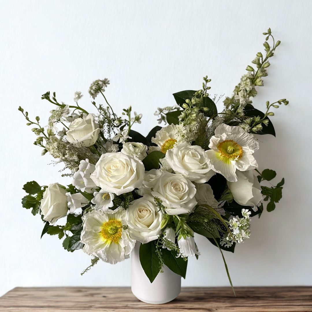 Luxury Premium sympathy arrangement in keepsake vase with seasonal blooms, delivered to Uptown Minneapolis, South Minneapolis, and Richfield
