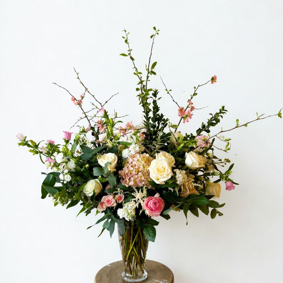 XL sympathy floral arrangement with abundant seasonal blooms in keepsake ceramic vase, refined and natural garden-style design delivered to Edina, Uptown Minneapolis, and Minnetonka