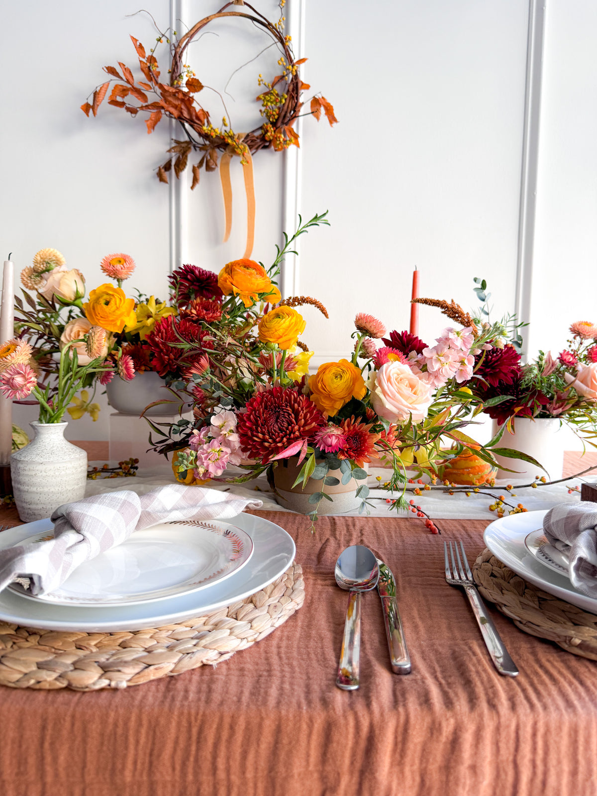 Premium Thanksgiving arrangement with abundant seasonal blooms in shades of orange, peach, burgundy, and gold, lush garden-style design in keepsake vase, from a local, small-business, women-owned flower shop