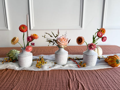 Trio of Thanksgiving bud vases with seasonal autumn blooms in shades of orange, rust, burgundy, and gold, garden-style arrangement in keepsake ceramic vases, available for Edina pick-up or Minneapolis delivery