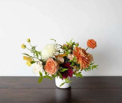 Classic garden-style Thanksgiving floral arrangement featuring delicate fall blooms and textured greenery, perfect centerpiece or gift, pick-up in Edina or local delivery