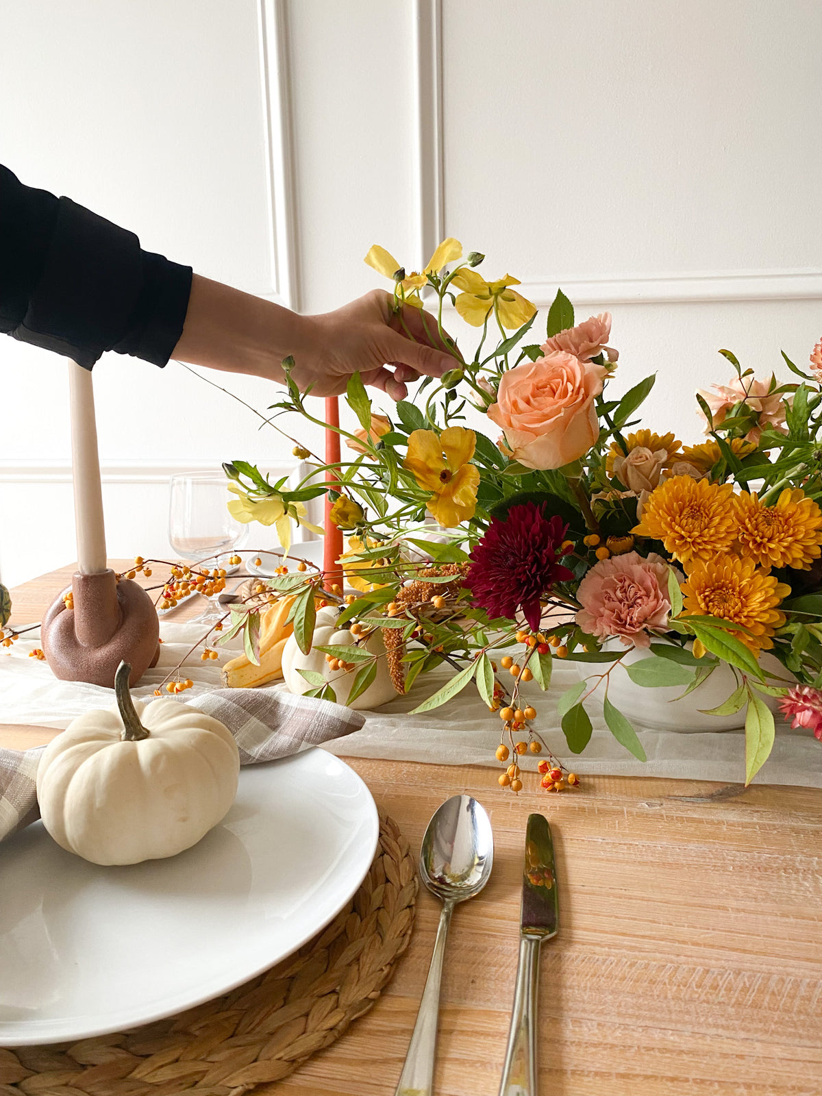 Luxury Deluxe Thanksgiving floral arrangement featuring lush autumn blooms in shades of orange, burgundy, and gold, garden-inspired design, pick-up in Edina or local delivery