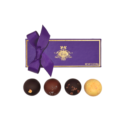 Four piece truffle set from Vosges chocolates for delivery with flowers from The Petal in Minneapolis