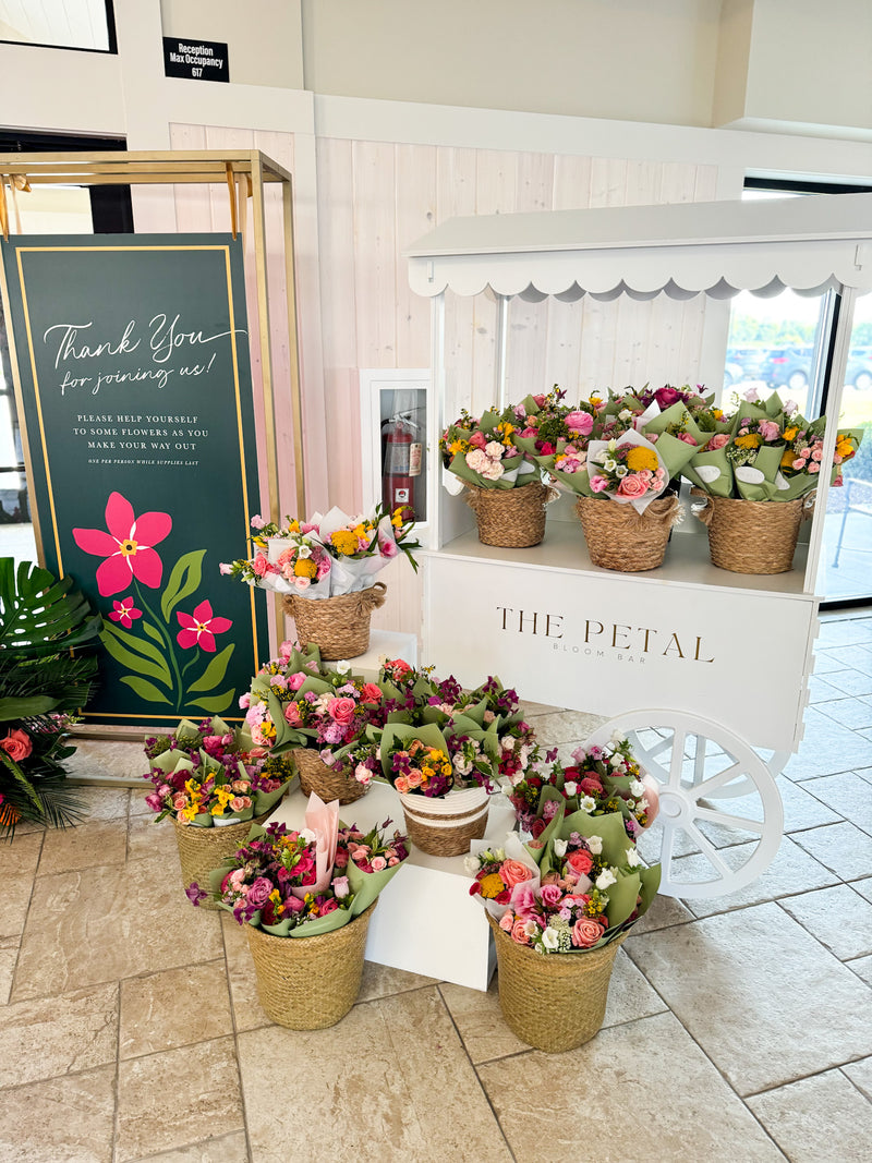 Display of bouquets at a corporate event on our Bloom Bar flower cart in Minneapolis at Equestria West. Perfect for baby shower, bridal shower, or corporate event.