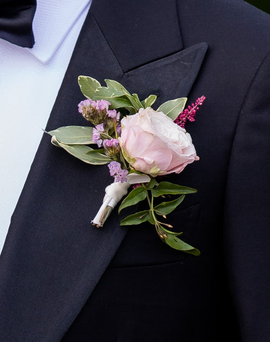 Lavender boutonniere with greenery for an a la carte wedding celebration for order in Minneapolis for pickup in Edina.