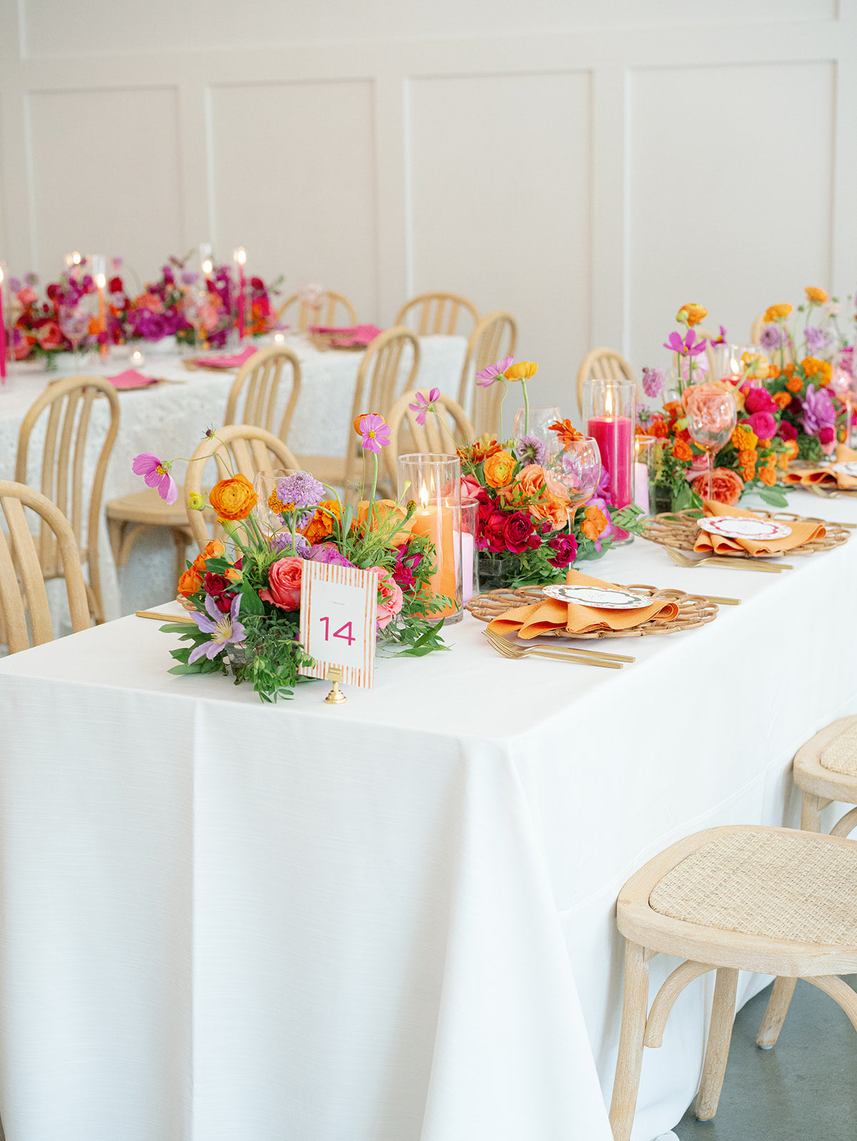 Lush, organic wedding centerpieces featuring premium garden roses, ranunculus, and cosmos for a high-end special event in Minnesota