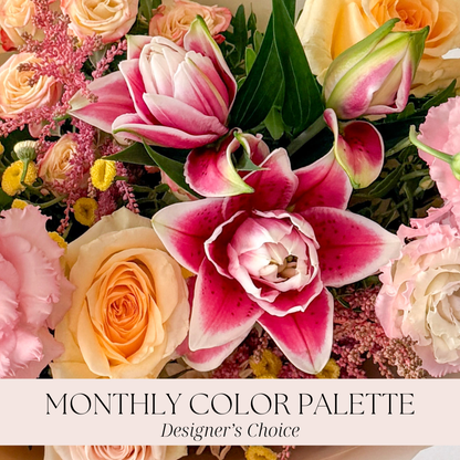 A close up of pink and yellow flowers for the monthly color palette from The Petal for August delivery.
