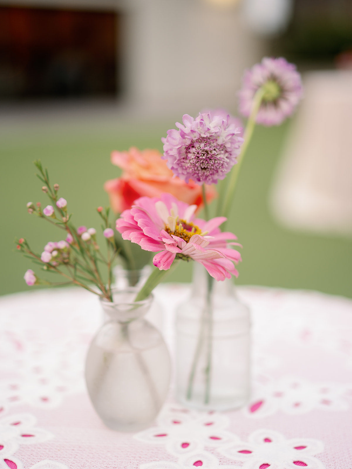 colorful bud vase designs with local flowers for cocktail tables wedding in minnesota