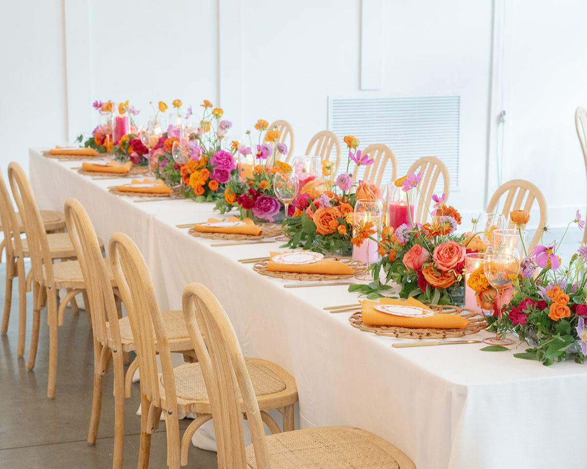 luxury garden style low centerpieces with pillar candles for long table Minneapolis