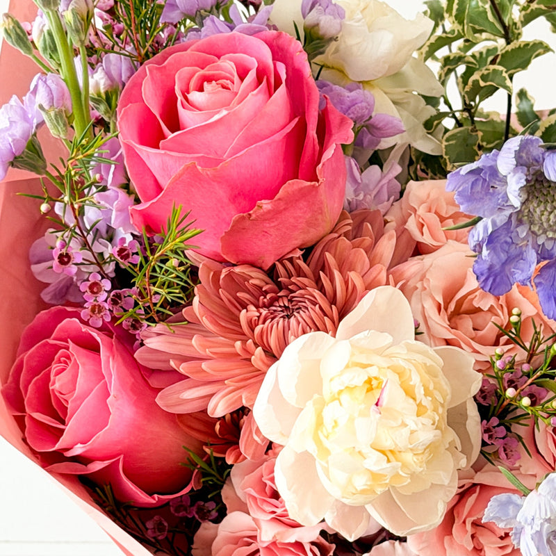 Bouquet of colorful flowers for a Bloom Bar cart event for a wedding, baby shower, bridal shower. Rent our flower cart for an upcoming event.