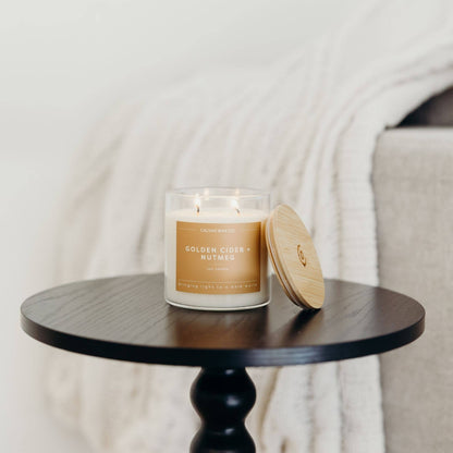 A double-wick soy candle fall scented to add onto your flower order for delivery in Minneapolis