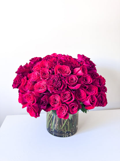 Romantic arrangement of 100 stems of red roses for your love. The perfect gift for her for an anniversary, birthday or just because from the best florist in minneapolis. Order for delivery to wayzata, minneapolis, edina, and savage.