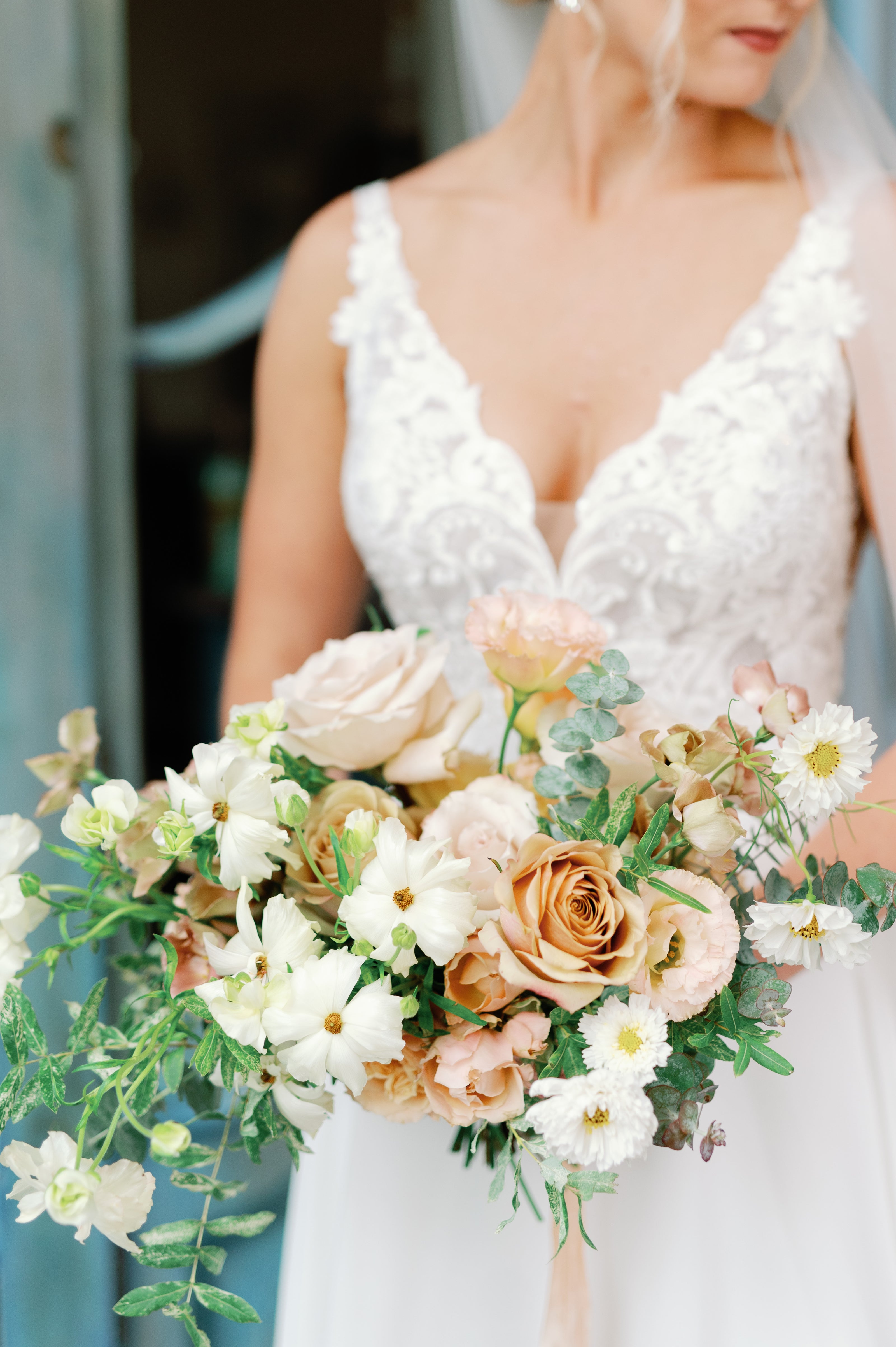 romantic garden-style bouquet of soft neutral flowers designed by top wedding florist, The Petal Floral Design