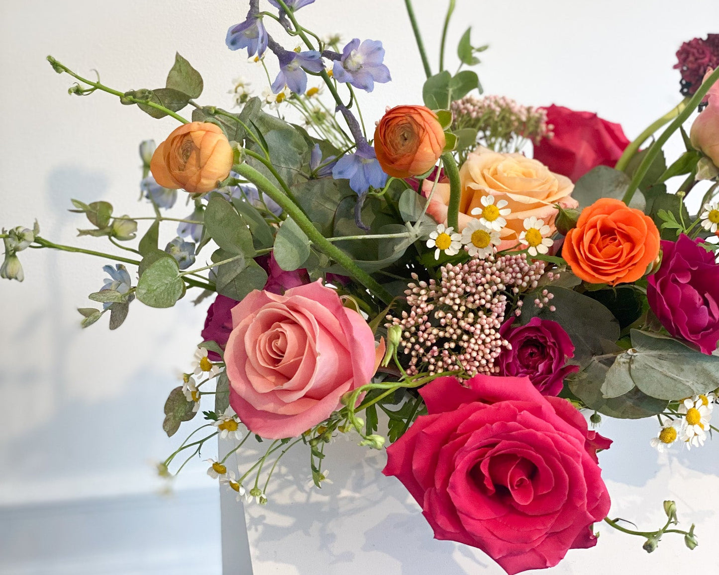 Centerpiece with colorful flowers for your upcoming special event, gala, corporate event, or shower. Local minneapolis delivery and pickup available.