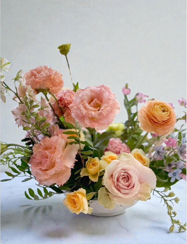 Special Event Centerpiece floral arrangement in soft pastels.