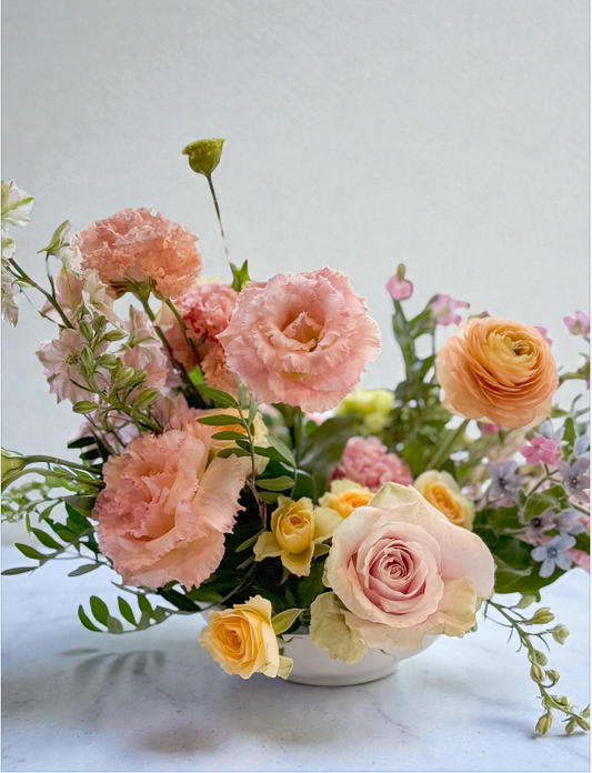 Special Event Centerpiece floral arrangement in soft pastels.
