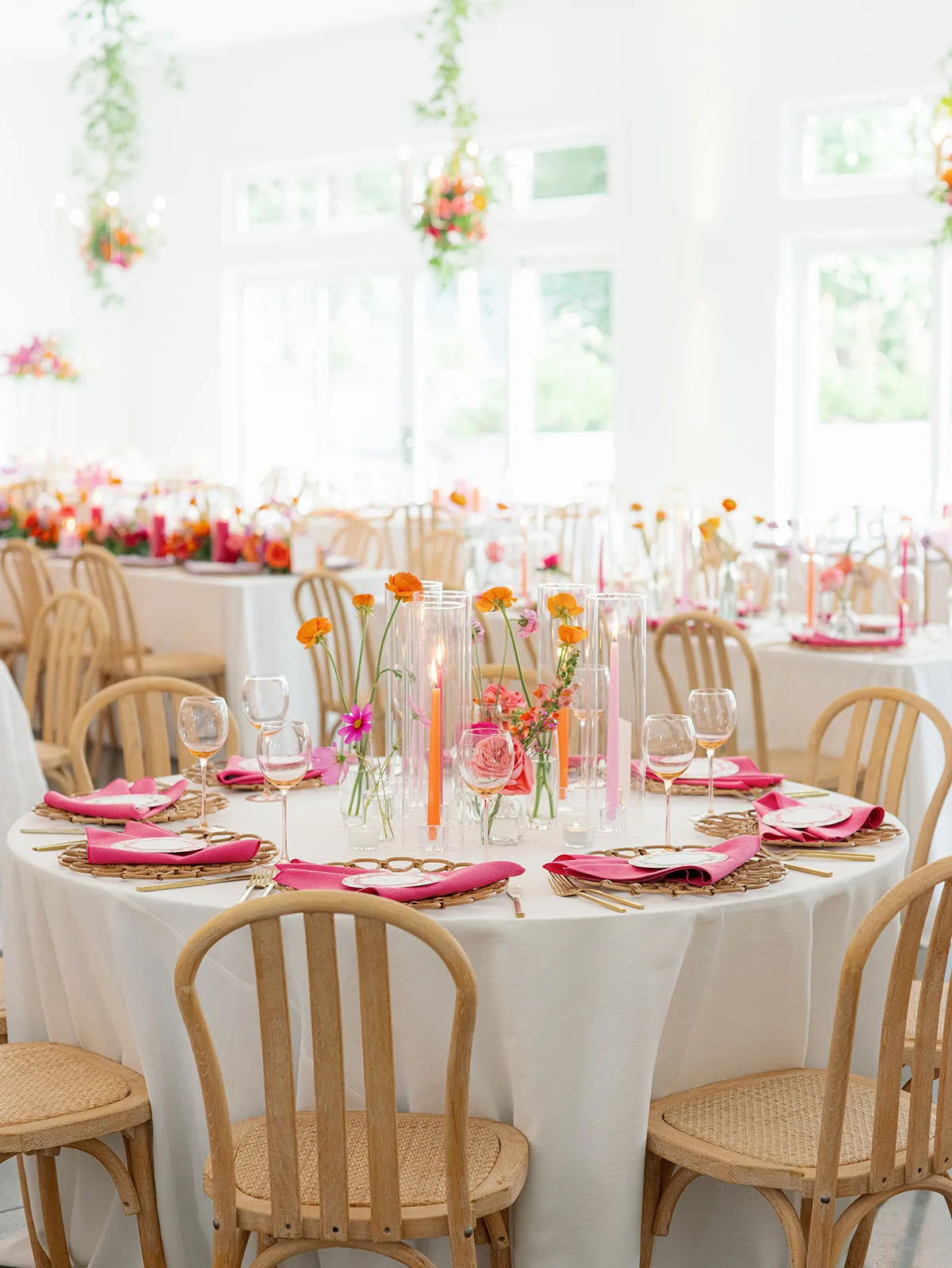 Centerpiece of colorful bud vases, taper candles and garden accents in minneapolis. Planned by Pink Peonies, florals by The Petal. Photographed by Amanda NIppoldt