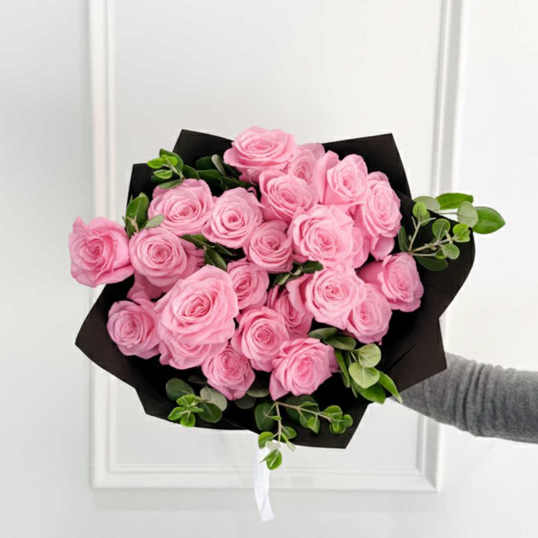 Pre-Order your Valentine's Day Flowers today! Hand-Tied Bouquet of pink roses wrapped in premium wrap paper. Order Now!